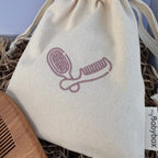 Bolsa bordada para guardar conjunto escova e pente