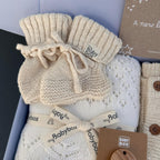 Detalhe dos produtos incluídos na baby box newborn maternity honey