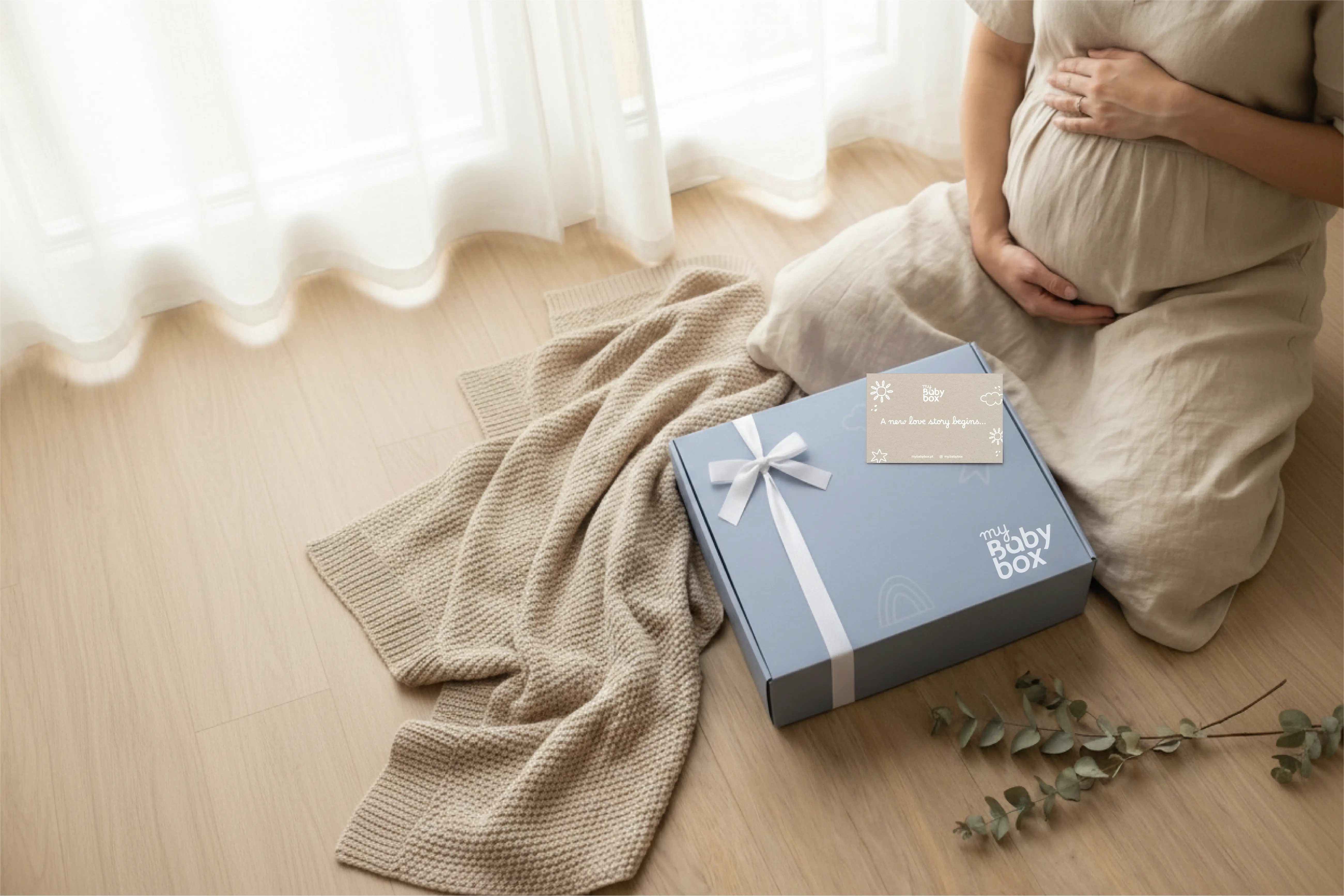 mãe grávida com baby box